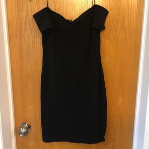 Black shoulder baring dress